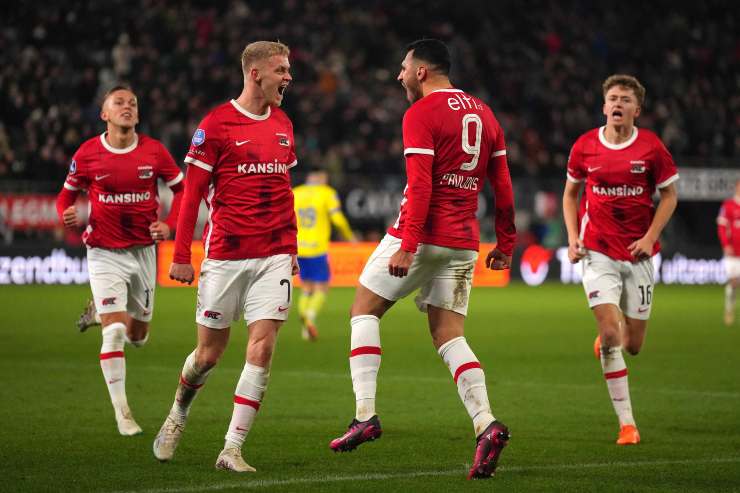 Odgaard and Pavlidis celebrate a goal