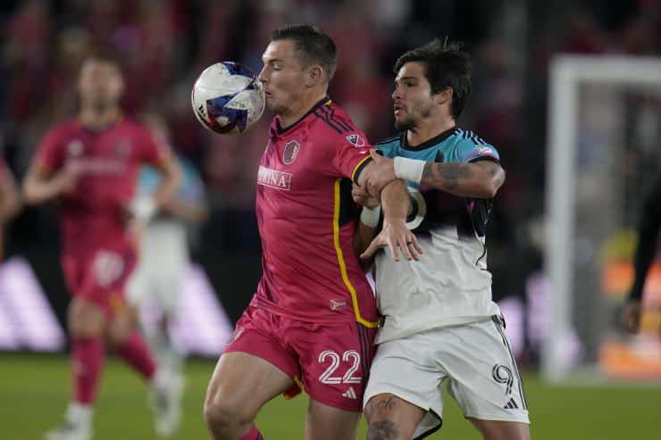 Minnesota United's Amarilla (right) takes on St. Louis' Hiebert