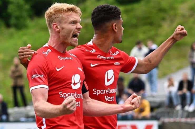 Brann players exult after a goal