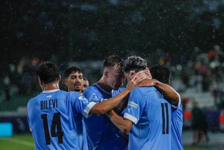 Israelis celebrate a goal