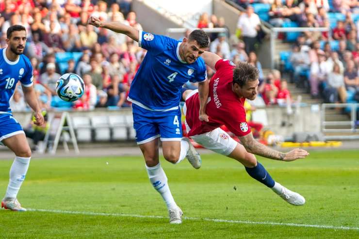 Cyprus' Ioannou (left) against Norway.